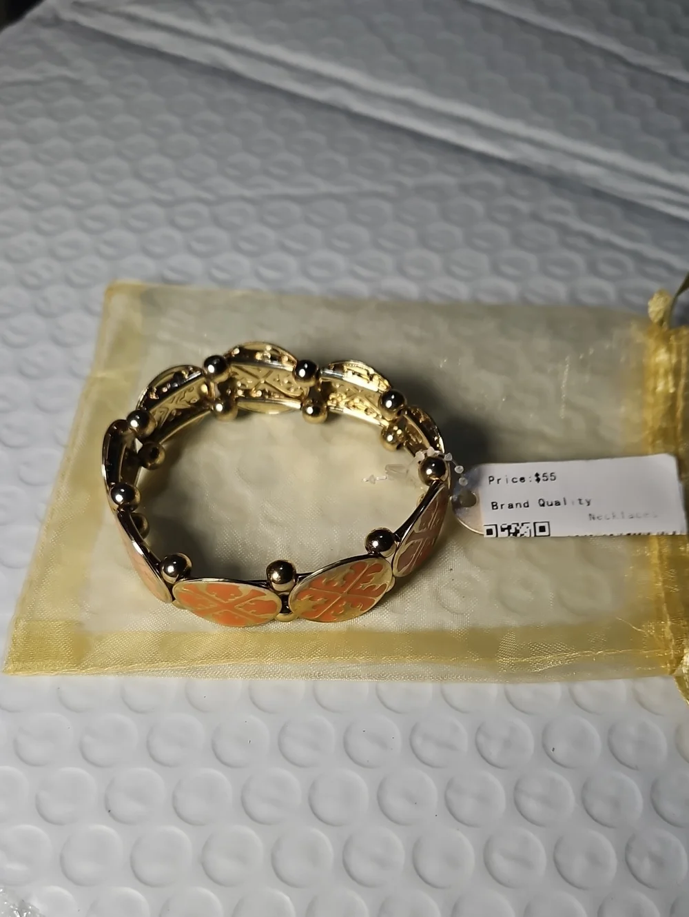 Tory Burch Gold-Tone Bracelet with Coral Orange Enamel Clover Motifs